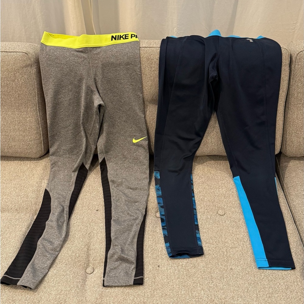 Set of 2- (1) Reebok legging Blue & (1) Nike legging Gray and Black